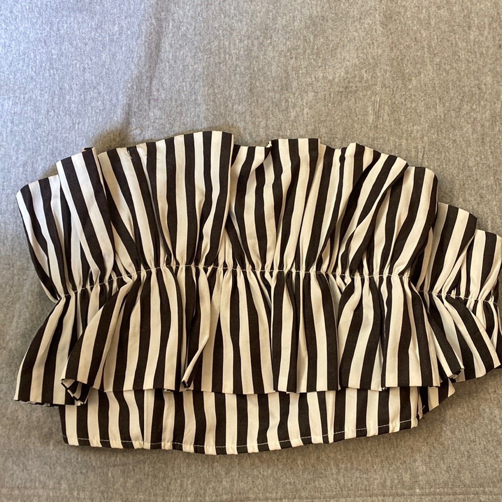 Black and white stripped ruffled, strapless top.